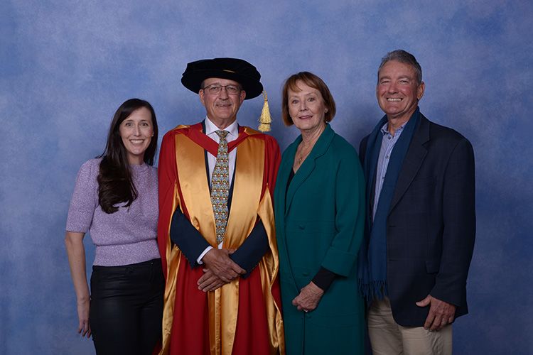 An image of Honorary Doctorate recipient Bob Christiansen with his family.