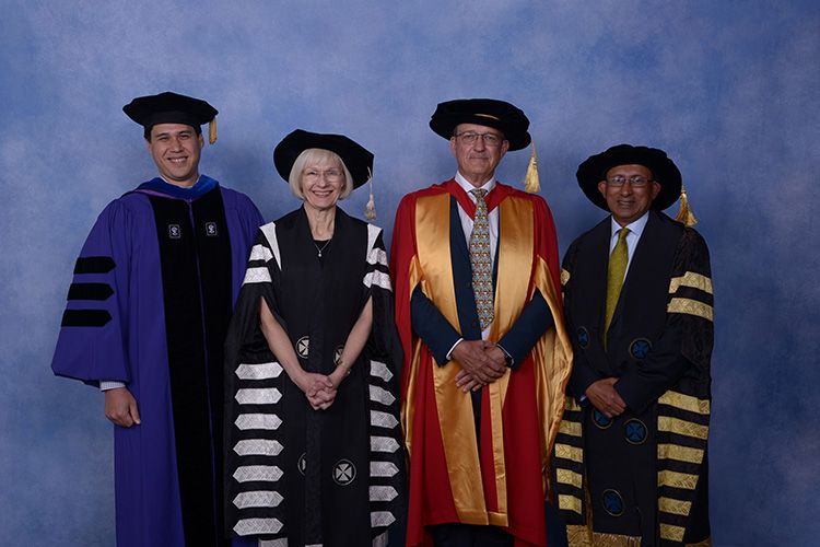 An image of UQ Deputy Head of School of Business Professor Tyler Okimoto, UQ Vice-Chancellor and President Professor Deborah Terry AO, Honorary Doctorate recipient Bob Christiansen and UQ Chancellor Peter Varghese AO.