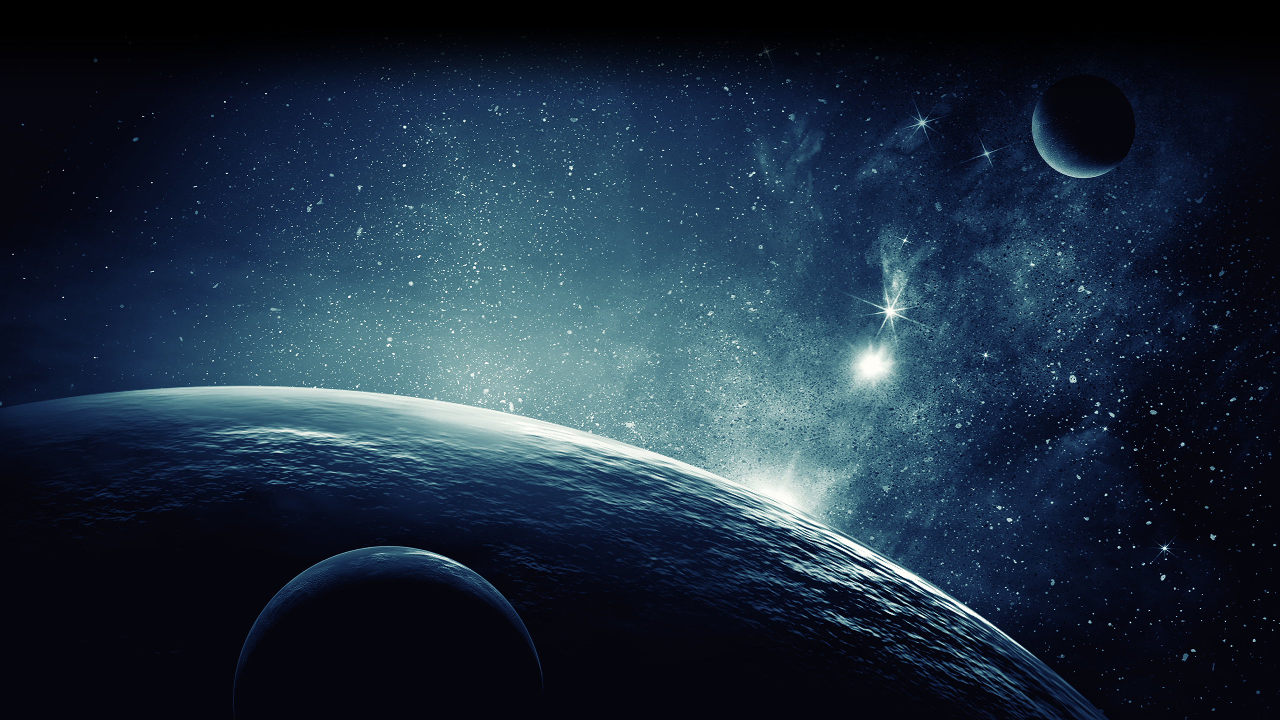 An image of planets and stars in outer space.