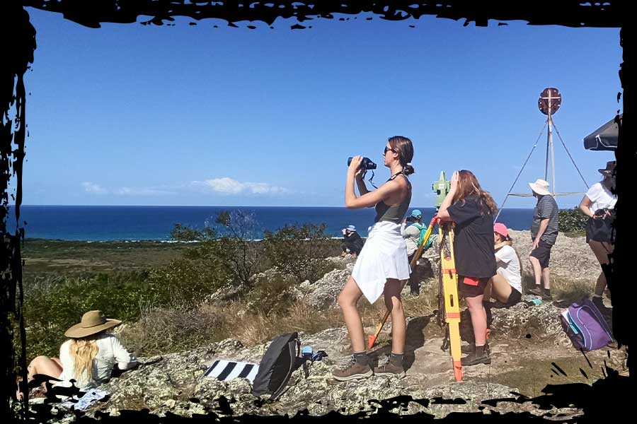 An image of volunteer marine science students keeping watch and collecting behavioural data from Emu Mountain, between Peregian Beach and Coolum.