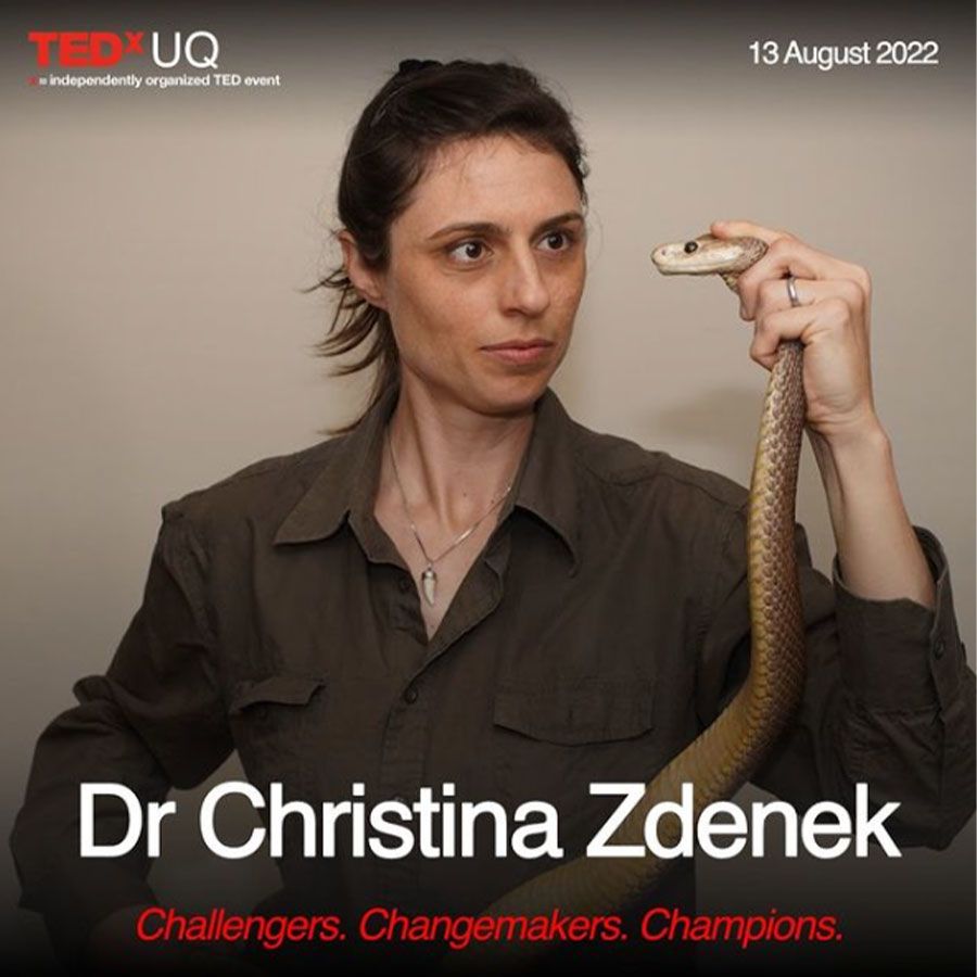 An image of Dr Christina Zdenek holding a snake