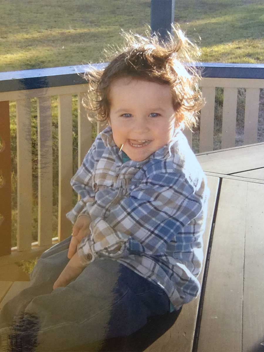 An image of Joshua Crow as a child in the Darling Downs.