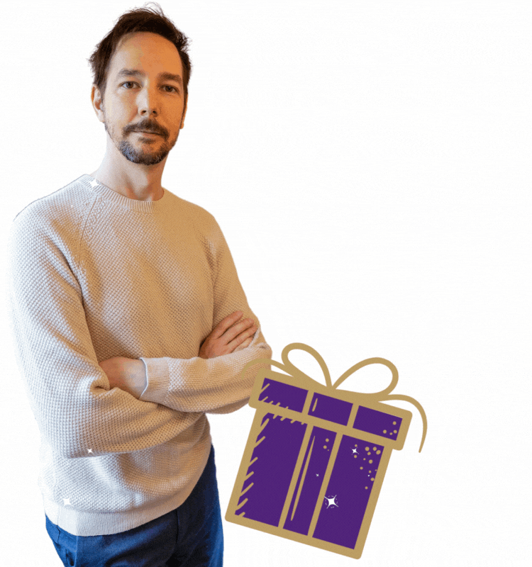 An animated image of Luke Hammond revealing a his jewellery designs popping out of an opening gift box.