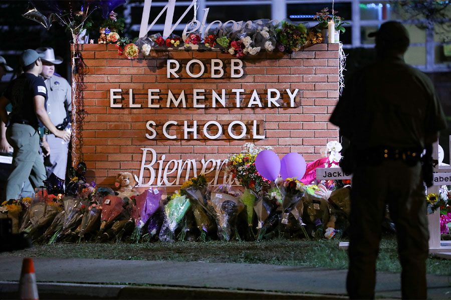 Texas state troopers outside Robb Elementary School, where 19 students and one teacher were killed during a mass shooting in on 25 May. 