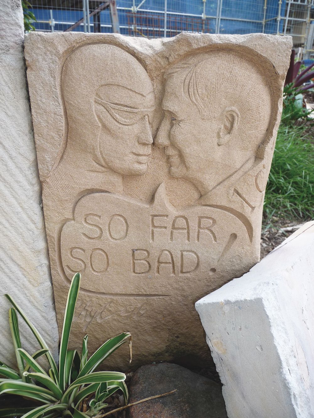 Sandstone carving of Hugh Lunn.