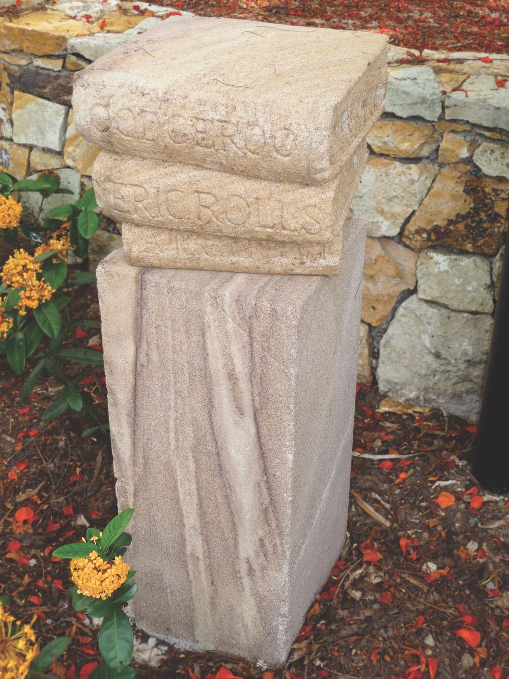 Sandstone carving of books
