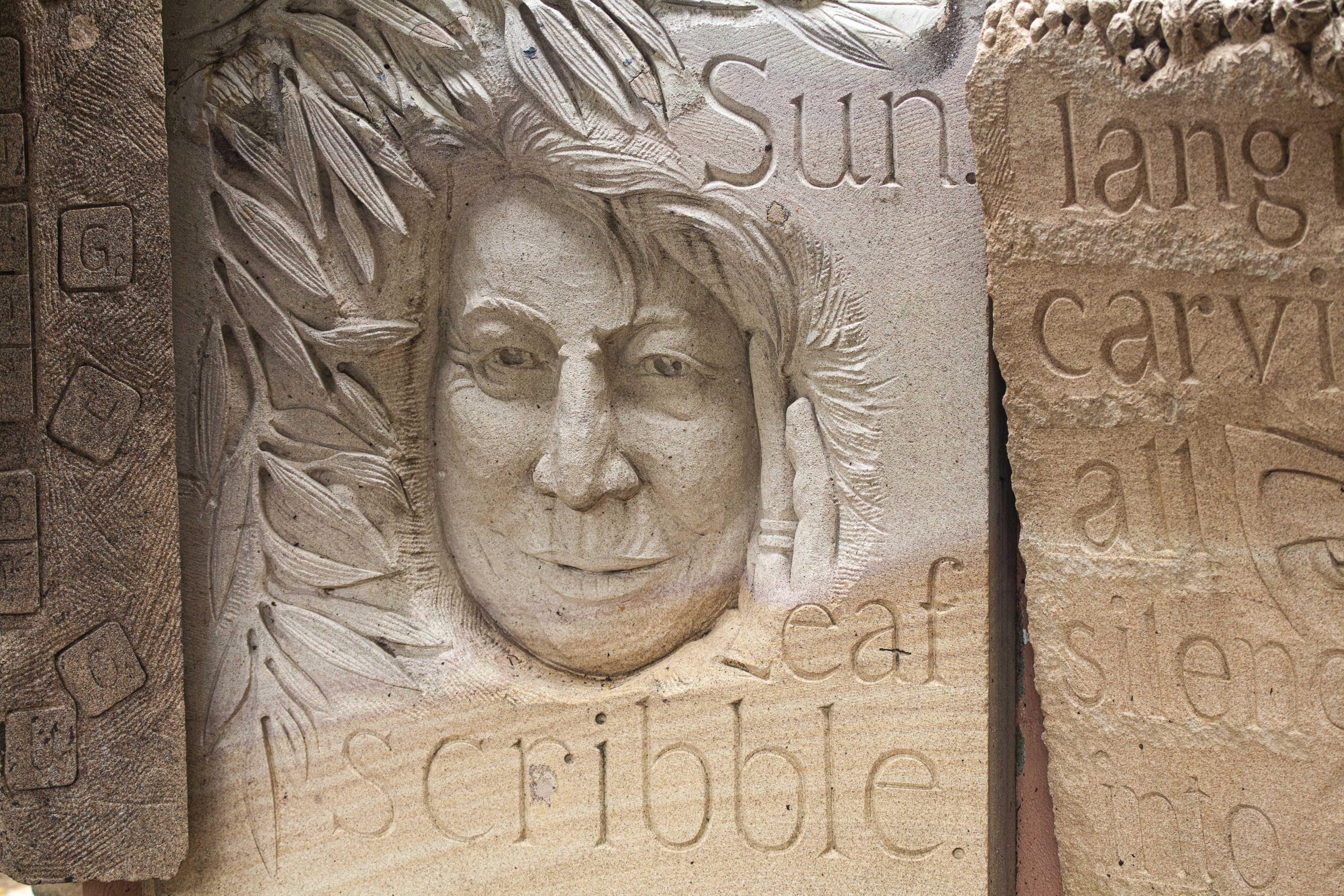 Carving of Thea Astley at Wordsmiths Cafe