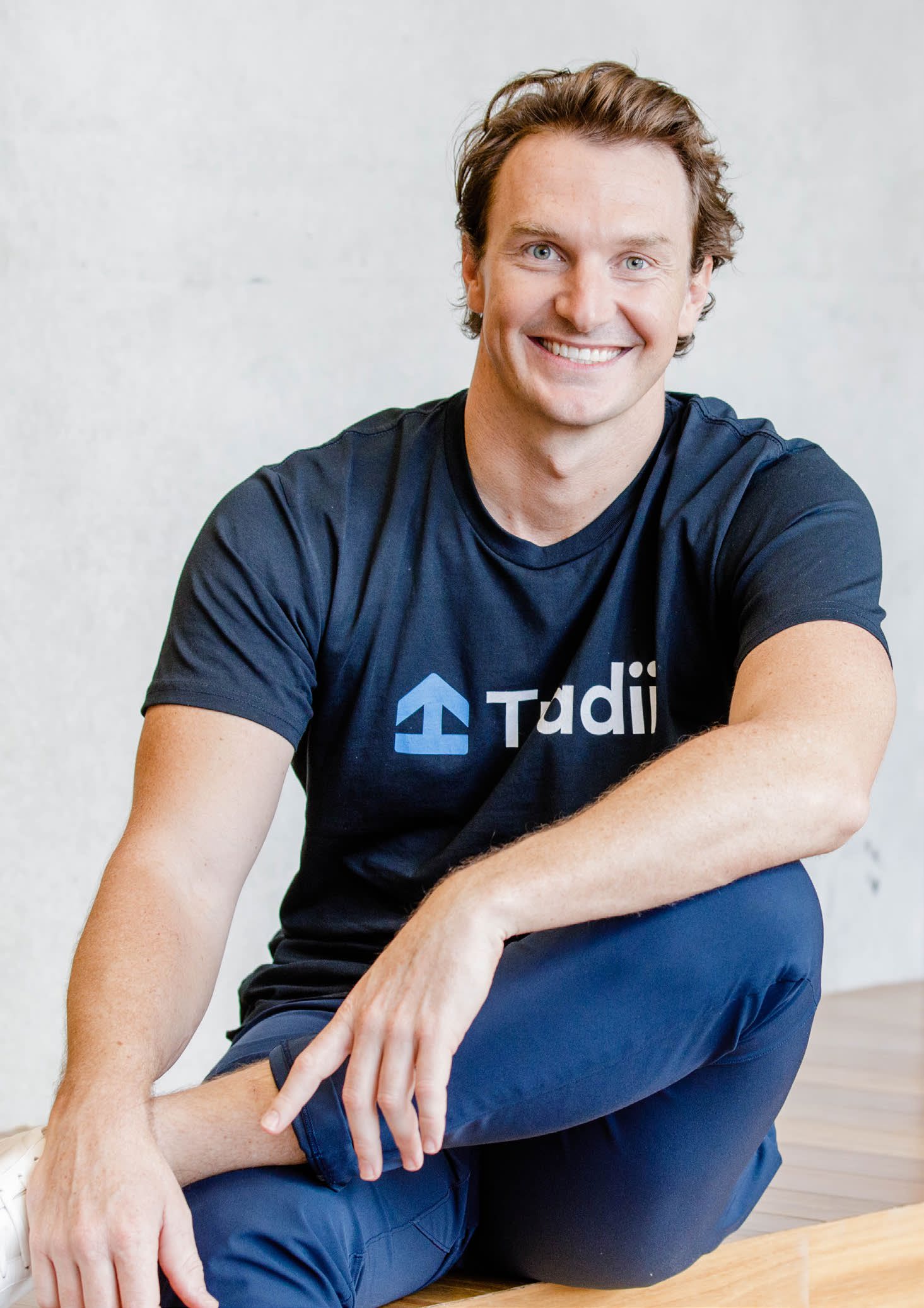 Profile image of Lachlan Wortman smiling at the camera and wearing a navy blue t-shirt.