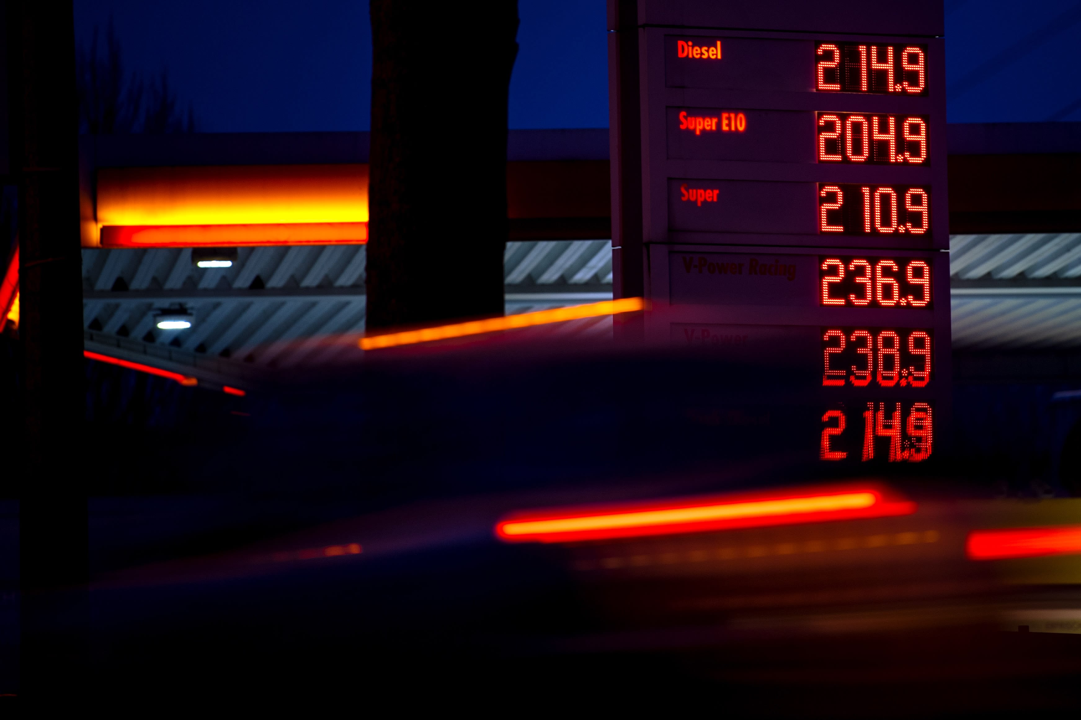 Price board at a petrol station showing prices over $2 a litre
