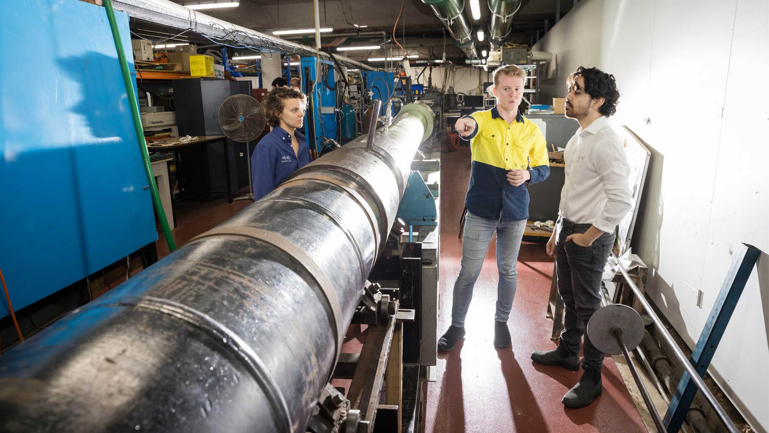 An image of Herik Lab team members working in a hypersonics lab.