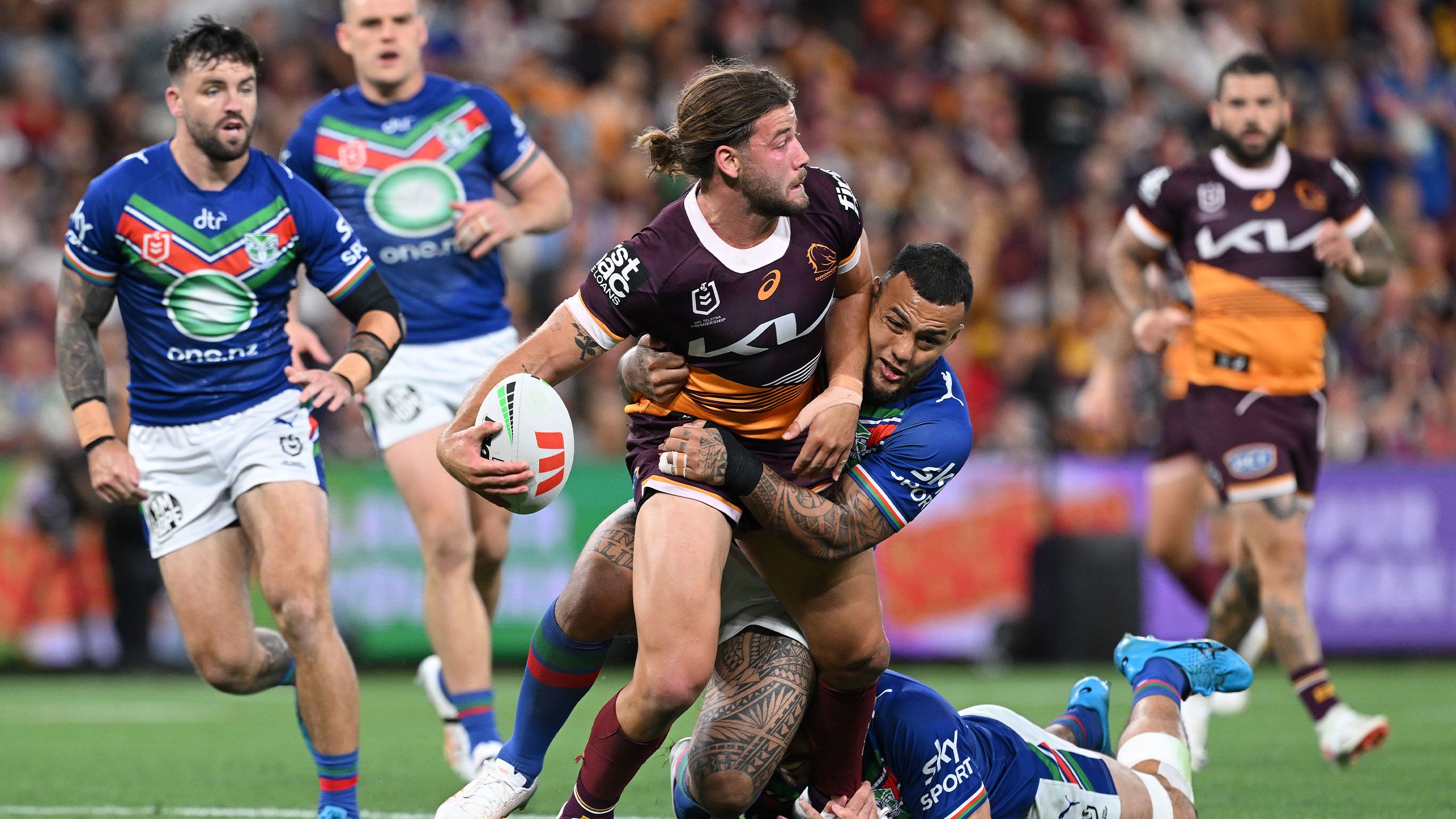 Pat Carrigan looks to offload the football against the Warriors in the 2023 Preliminary Final.
