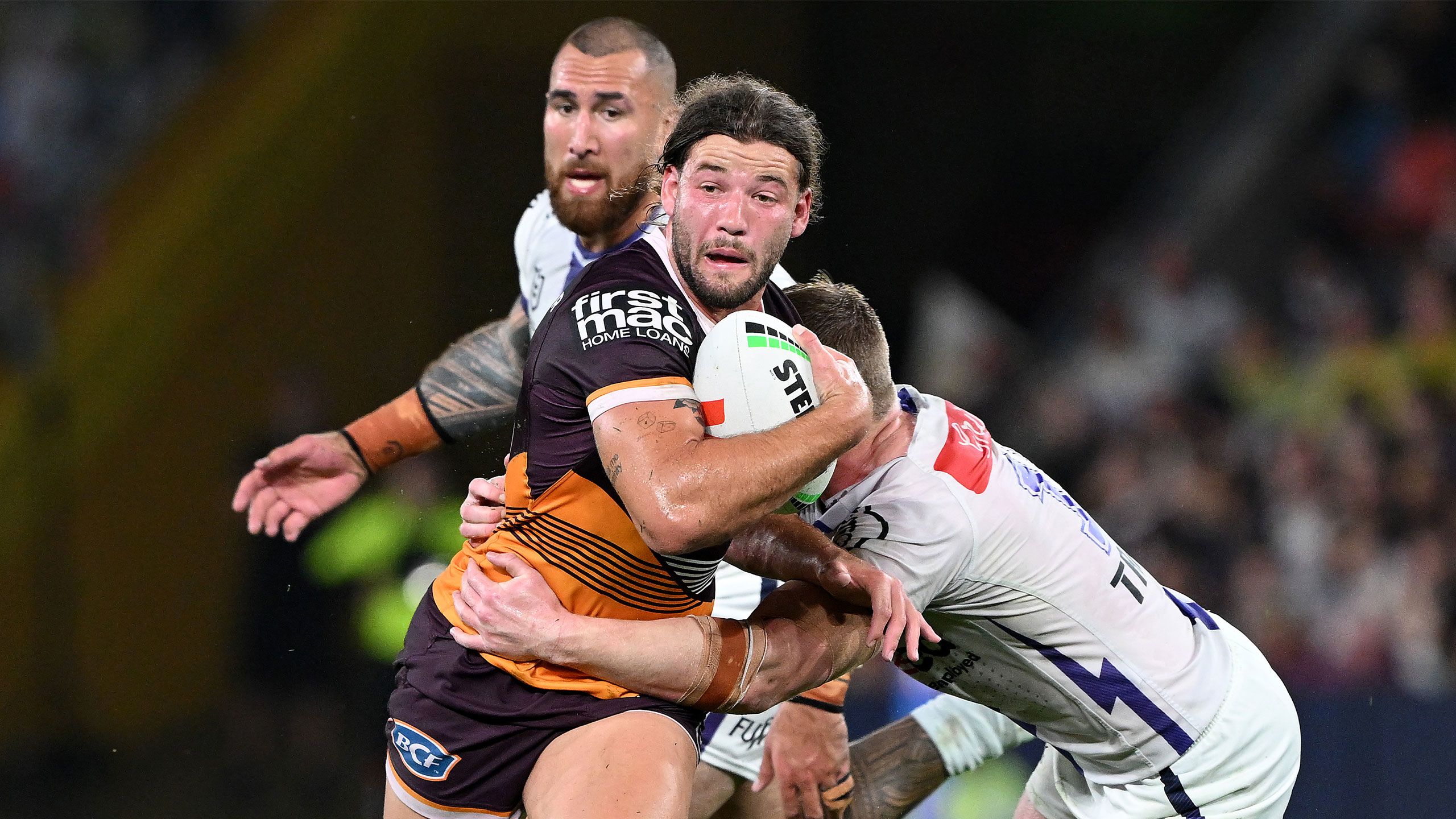 Pat Carrigan busts through a tackle against the Storm in the 2023 Qualifying Final.