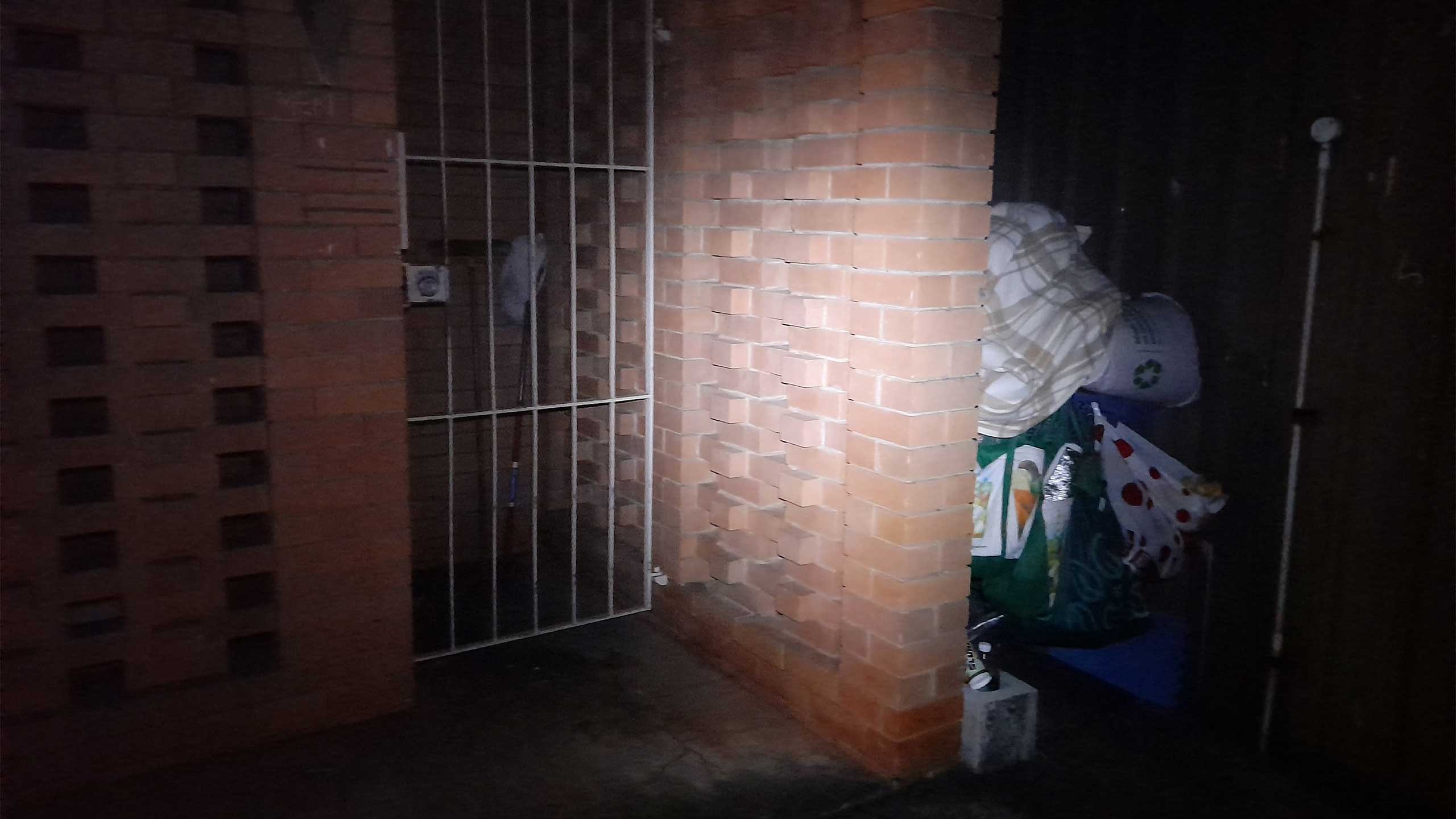 Brick cage showing storage of sleeping gear.