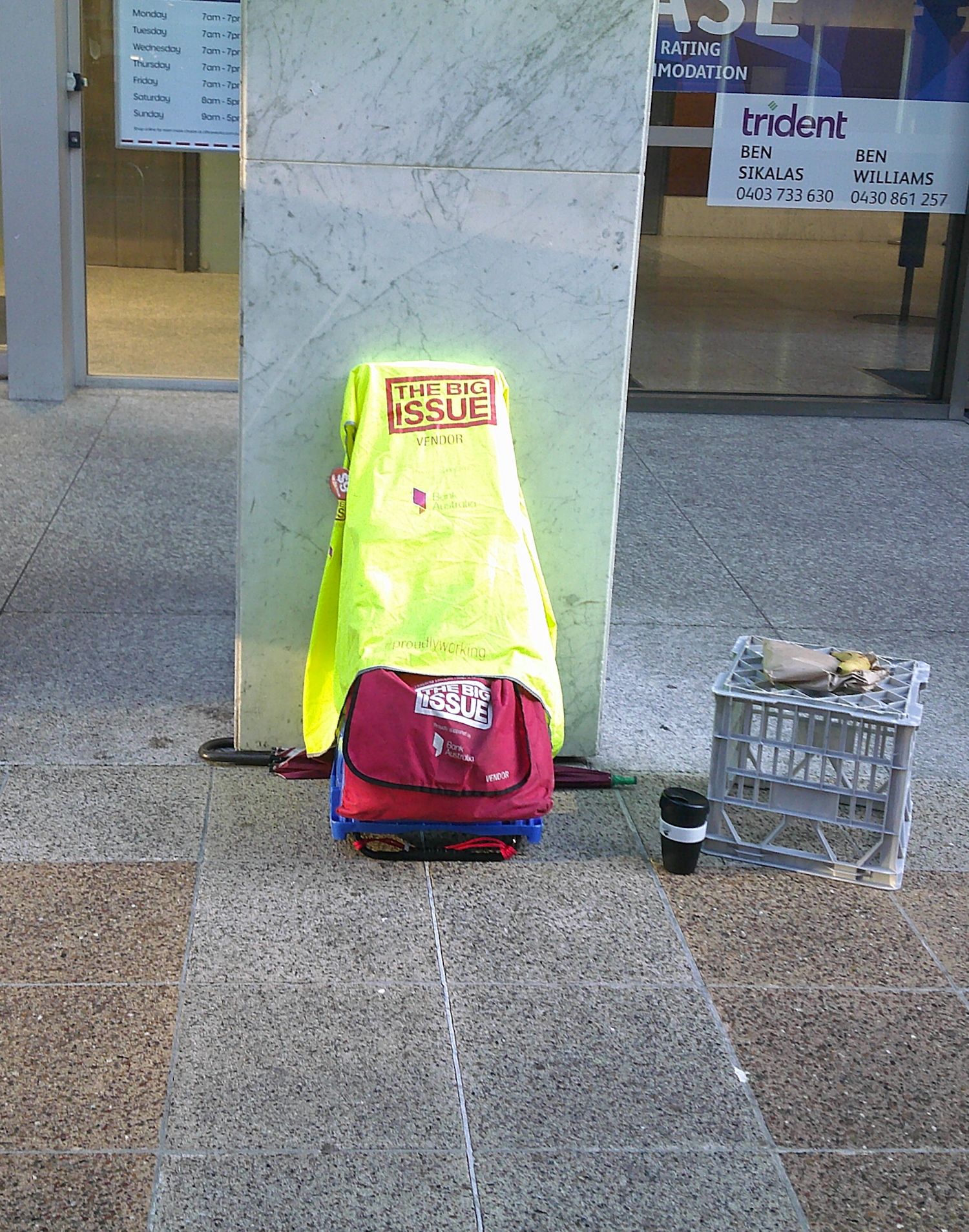 The Big Issue magazine stand and bag.
