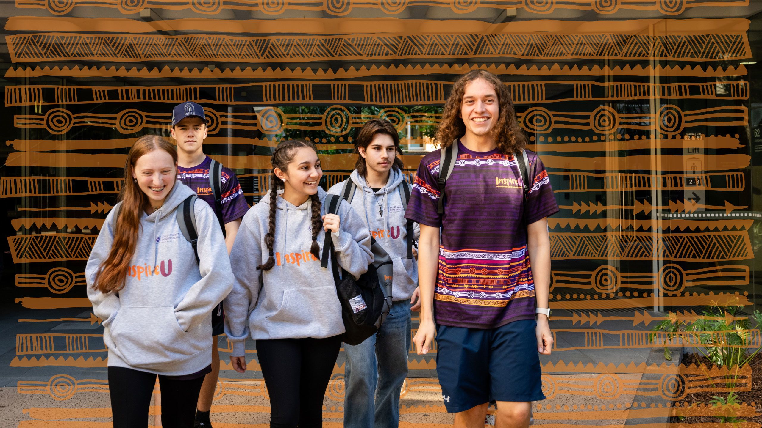 InspireU camp ambassador Angus Loft showing camp participants around UQ's St Lucia campus.