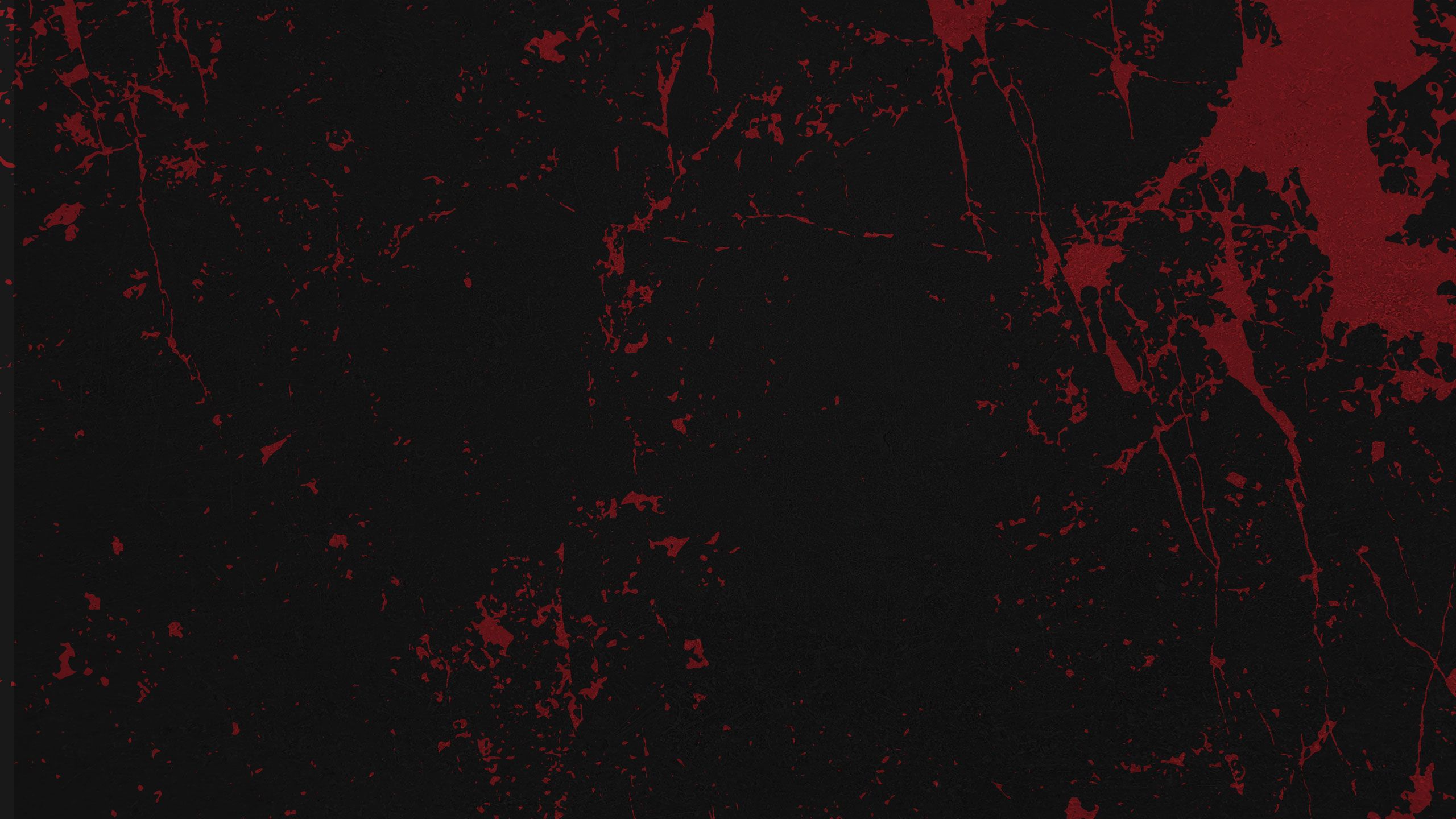 A graphic resembling blood splattered on a dark background.