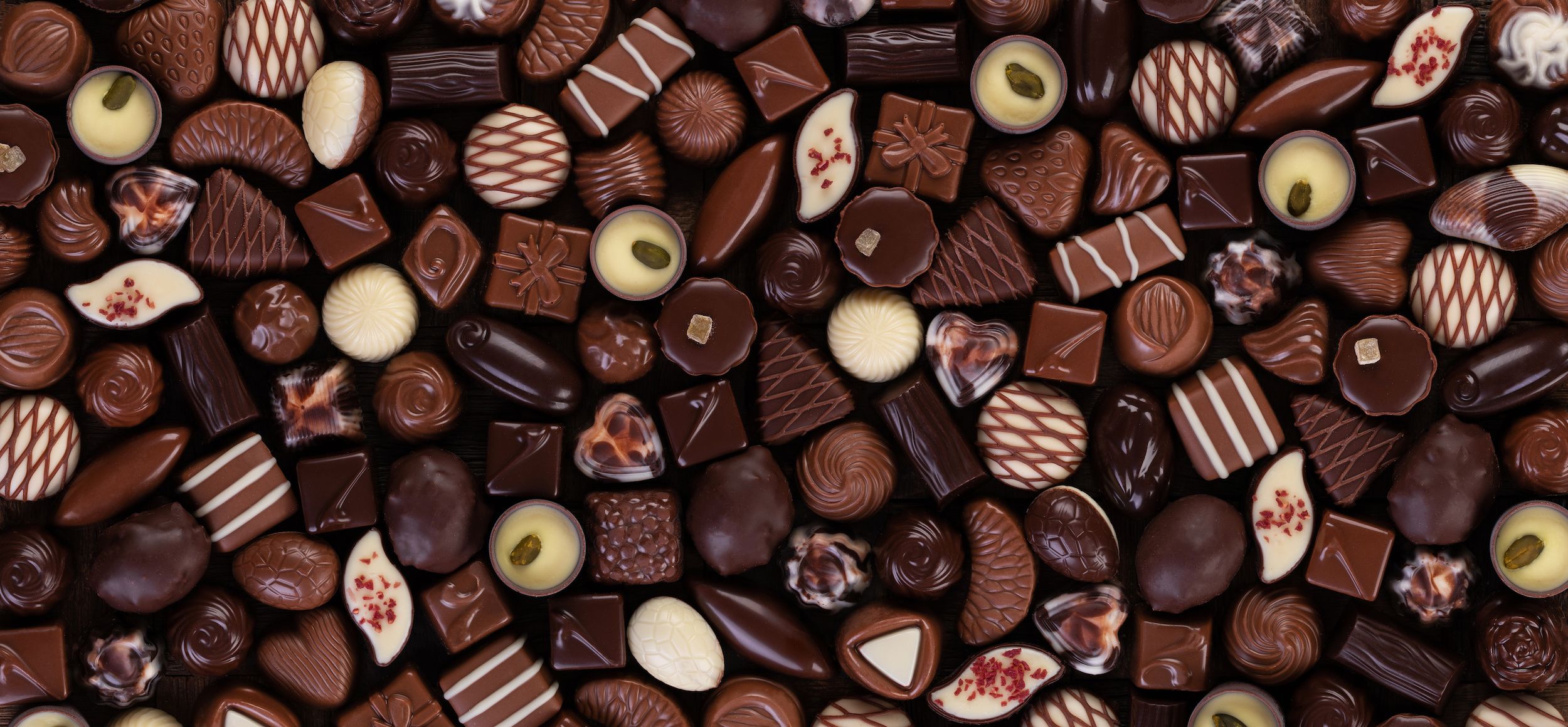 An image of a selection of beautifully decorated chocolates.
