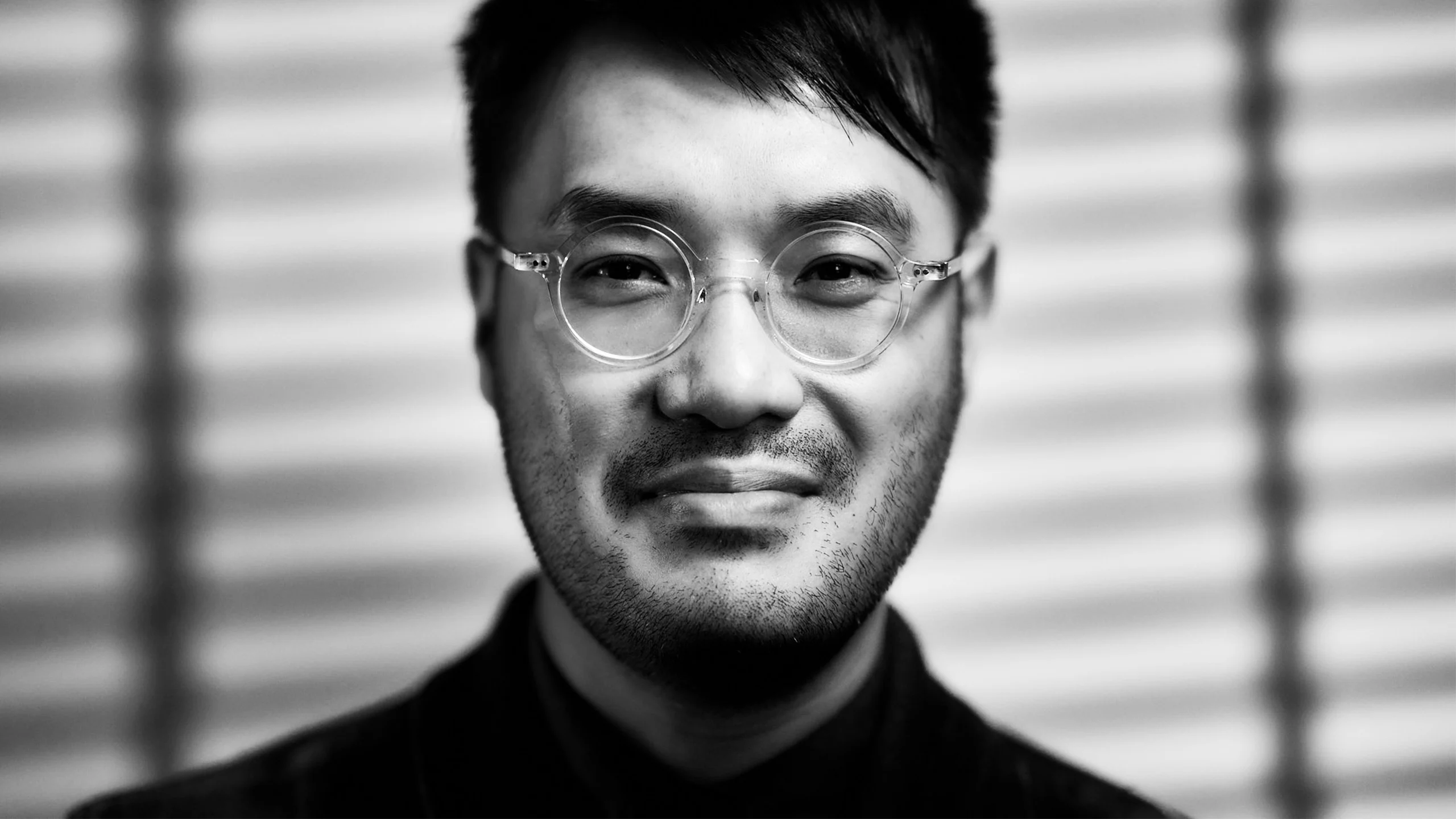 A close-up portrait image of Associate Professor Jack Wang.