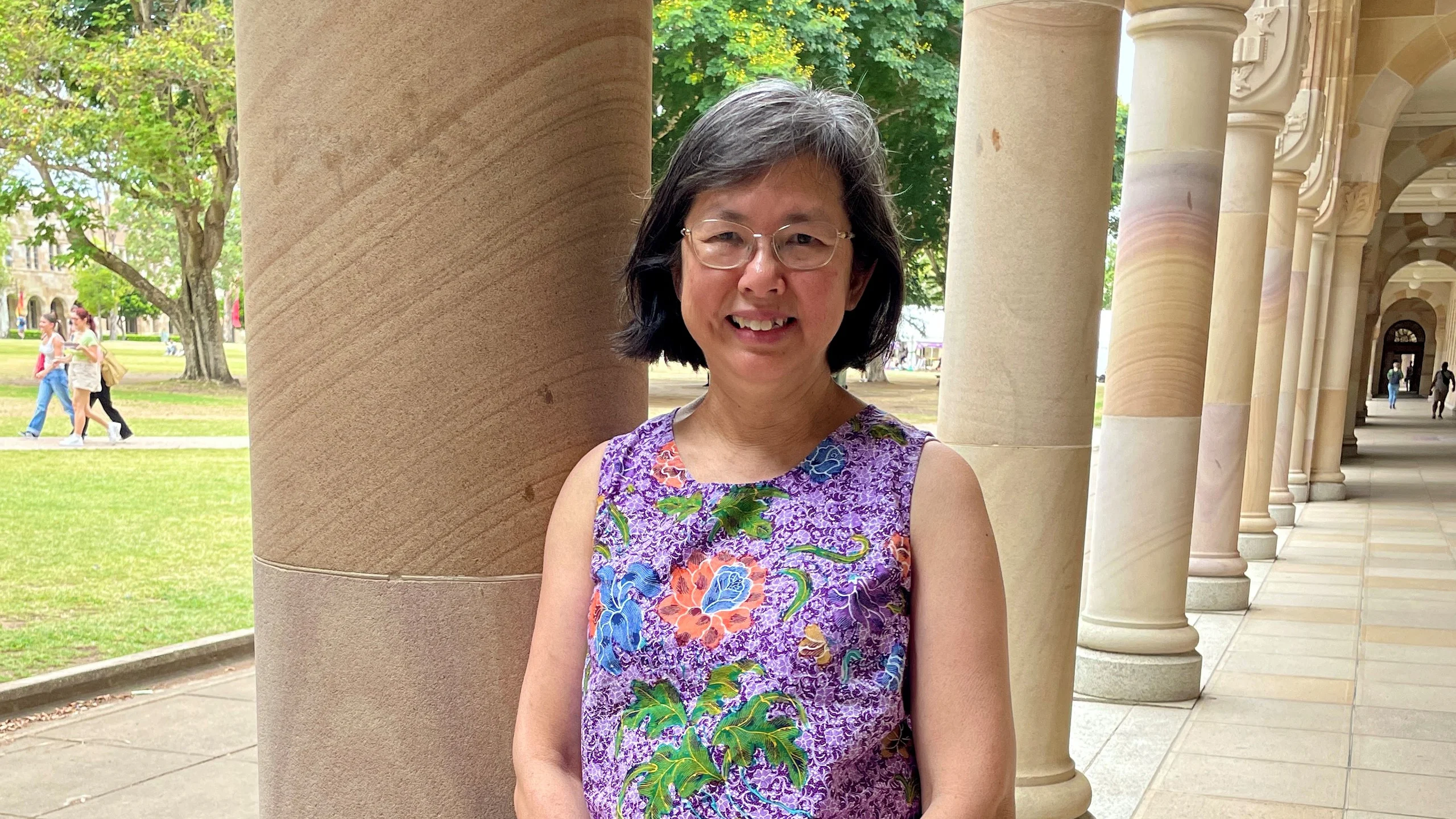 An image of Dr Poh Wah Hillocl standing in the Great Court at UQ.