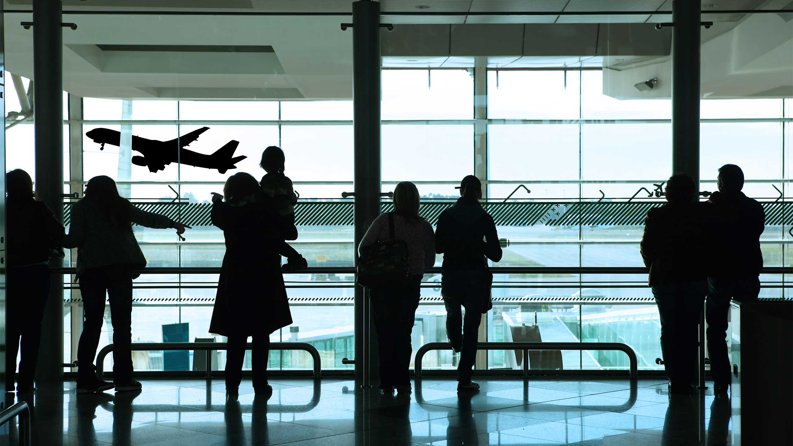 travellers waiting in airport lounge