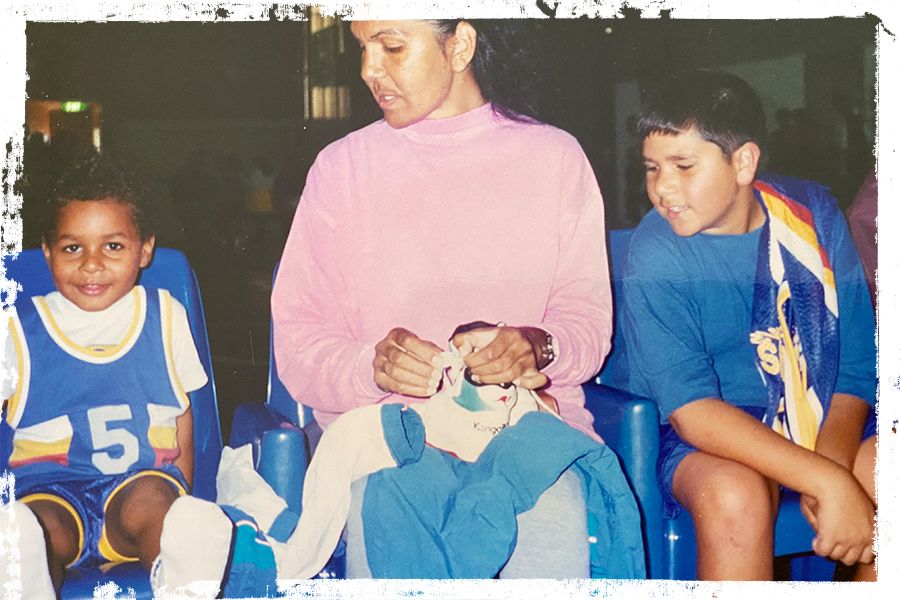 Six-year-old Patty Mills (left) during his formative years with Indigenous basketball Club, The Shadows.