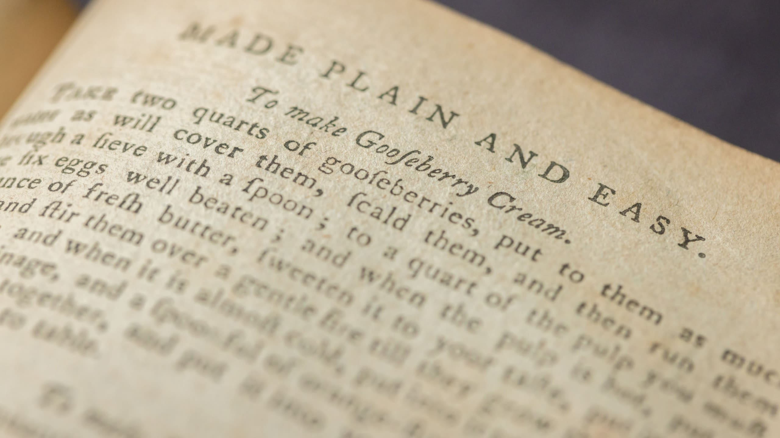 A browned and faded page of the book, with a gooseberry cream recipe