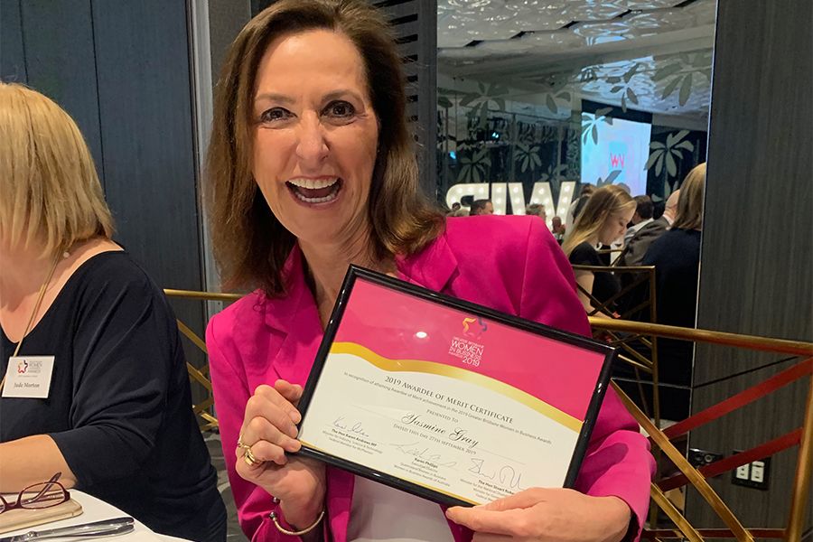 Yasmine Gray with her award at the Women in Business Awards in 2019, as Executive Director of Red Havas.