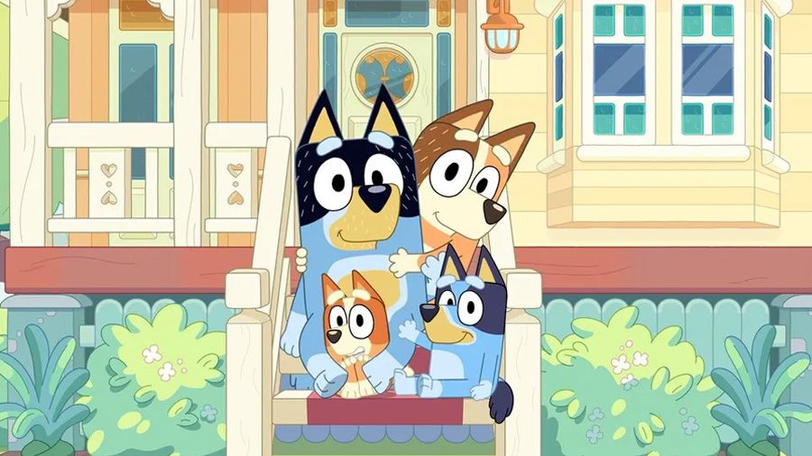 An image from the TV show 'Bluey' of the Heelers on the front steps of their family home