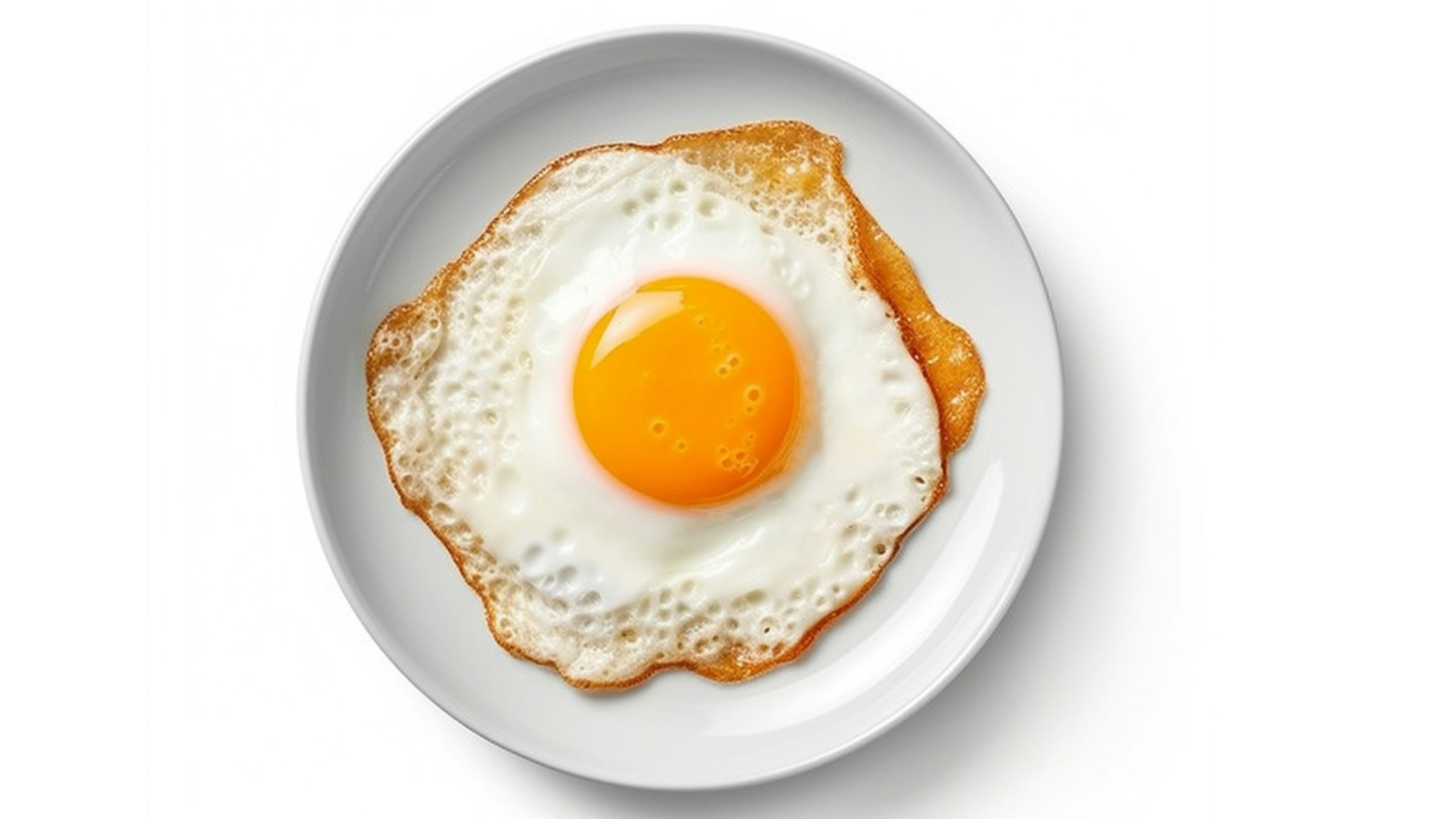 Fried Egg On Plate Isolated Background Top view