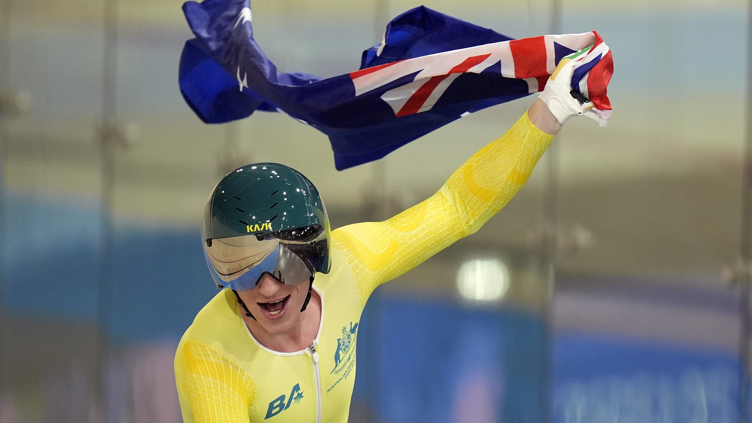 University of Queensland Cycle Club member Korey Boddington celebrates winning gold in the men's C4-5 1000m time trial. Image: Andrew Matthews/PA Images via Getty Images