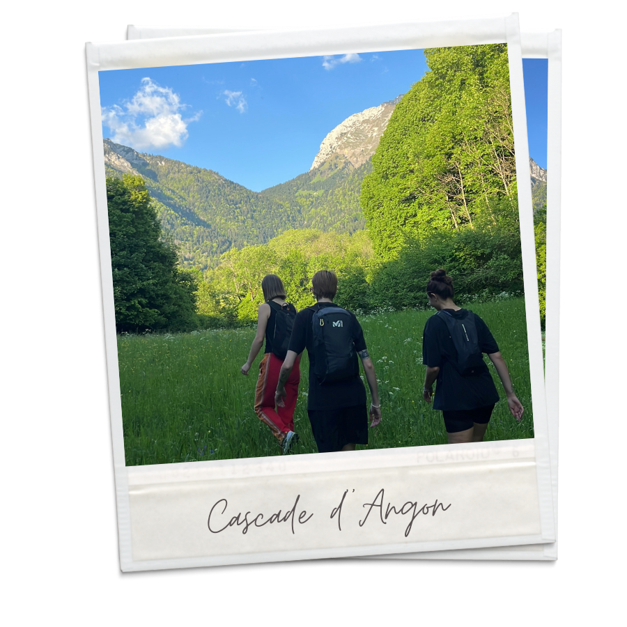 A polaroid of a group of 3 people hiking the Cascade d'Angon. 