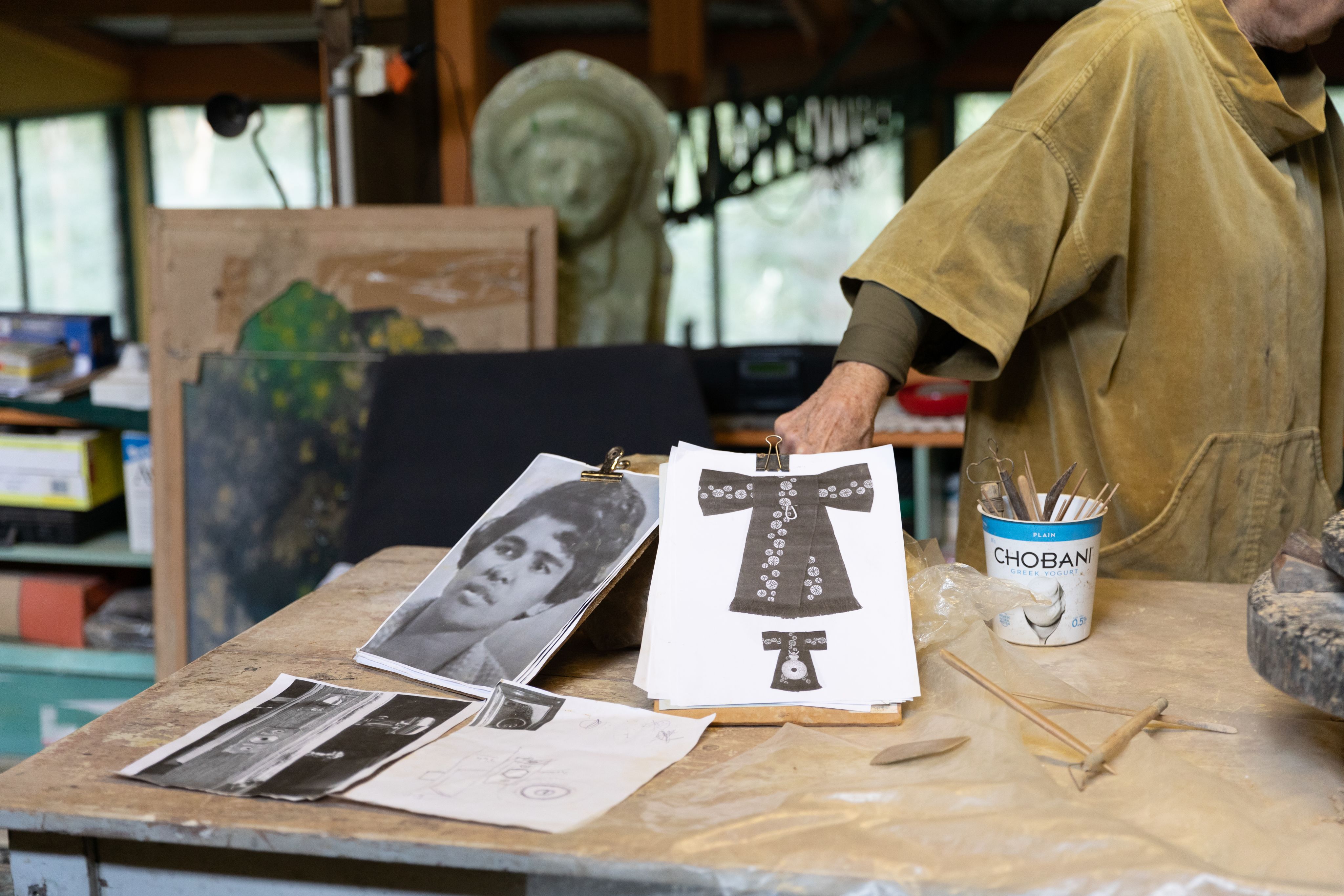 University Sculptor, Rhyl Hinwood AM CF was inspired by images of Valadian and her achievements, including the Officer of the Order of Australia insignia, while carving the grotesque.