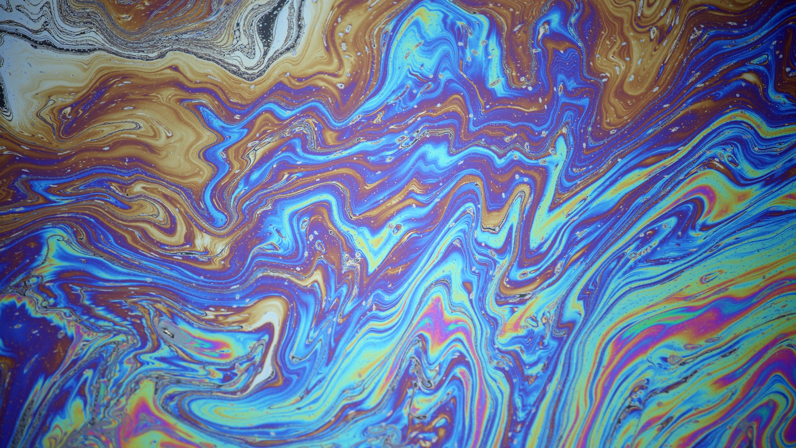 Image of a rainbow oil slick