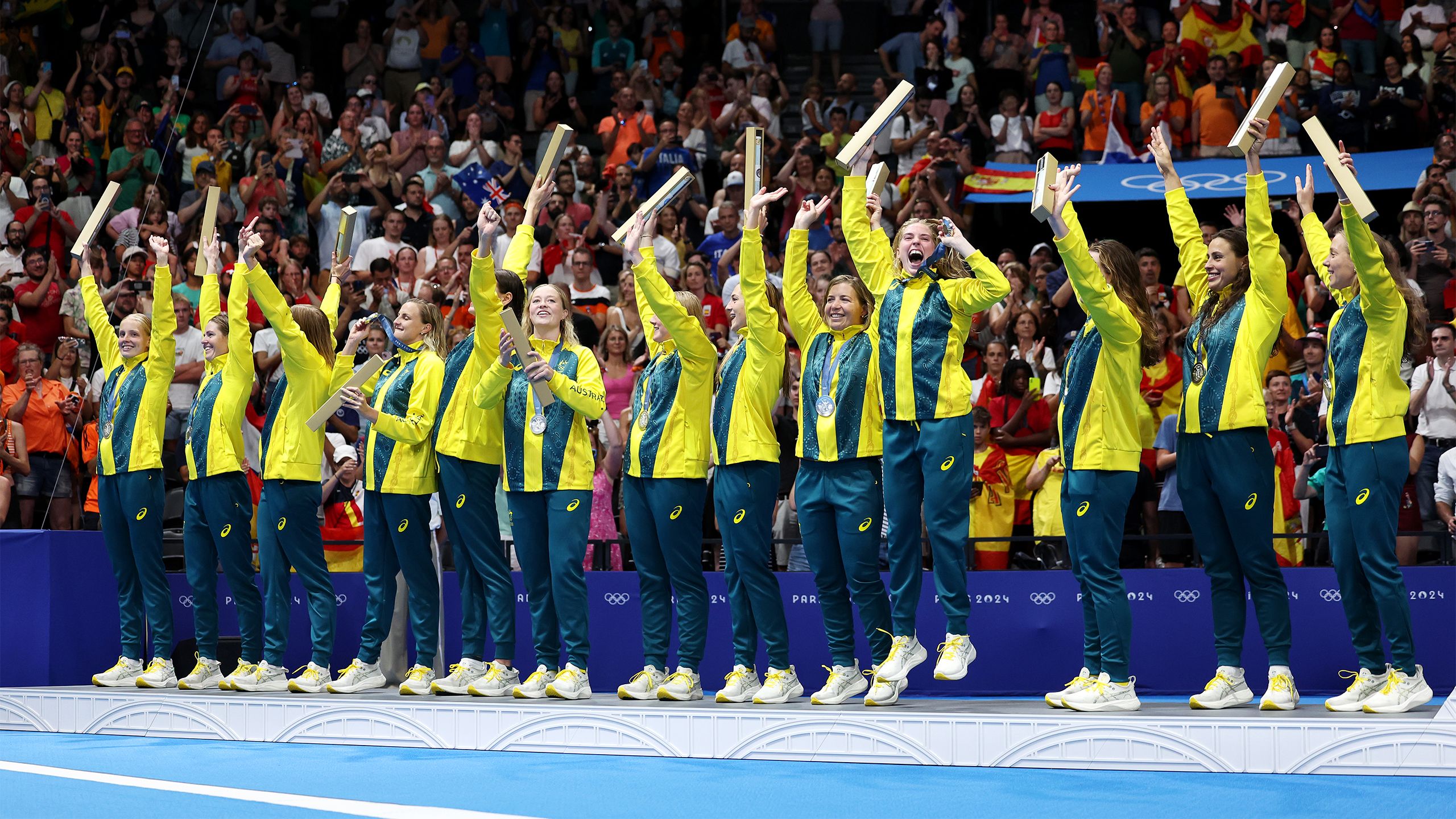 The Australian women's water polo team celebrate after winning a silver medal in Paris. Image: Quinn Rooney/Getty Images