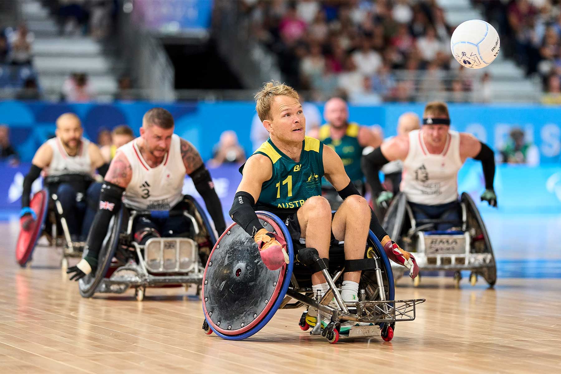 UQ Wheelchair Rugby Club player Beau Vernon in action against Great Britain.