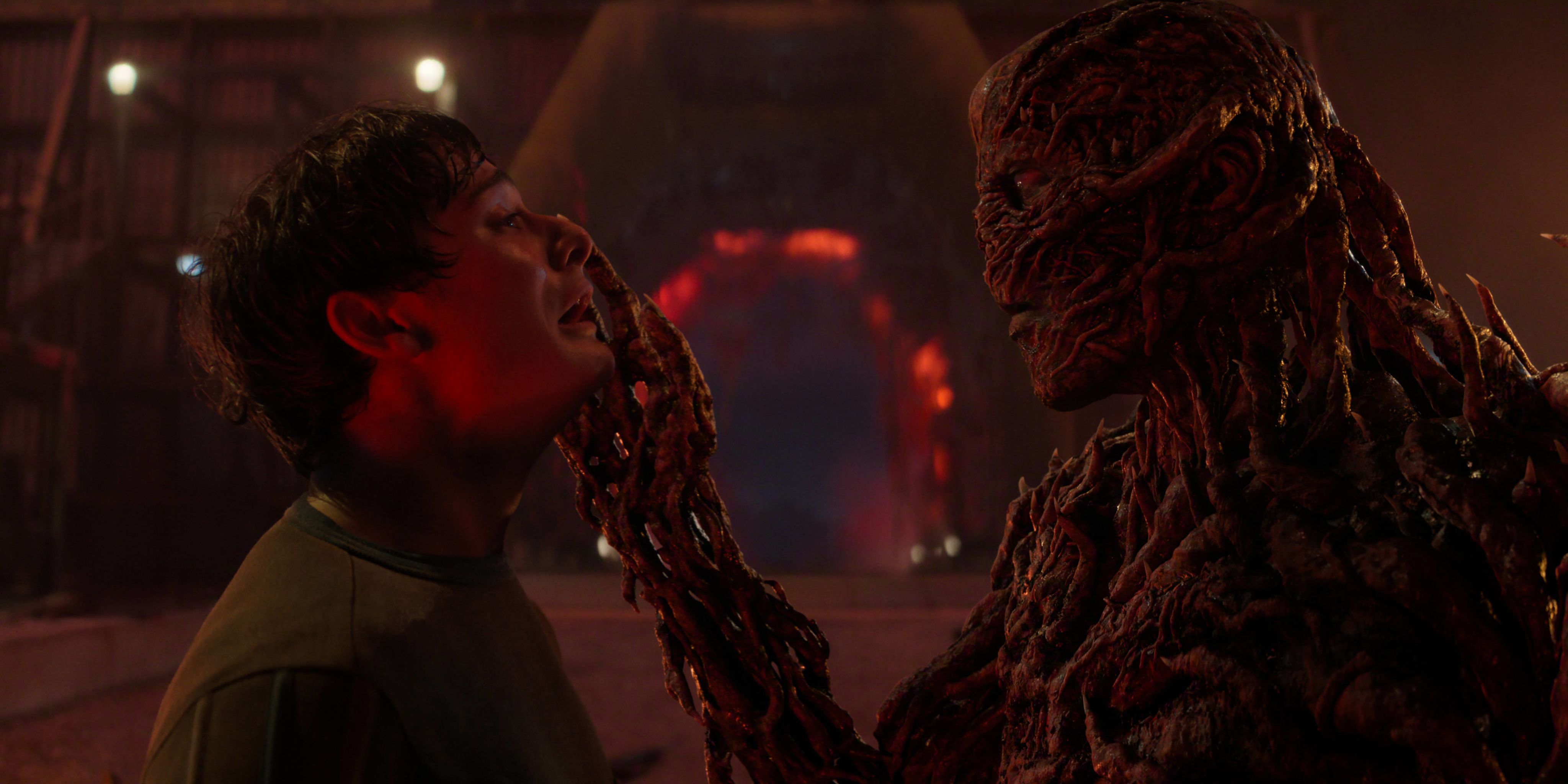 Will Byers (Noah Schnapp) is frozen in terror as Vecna (Jamie Campbell Bower), the show's villain and 'monster' grabs his face.