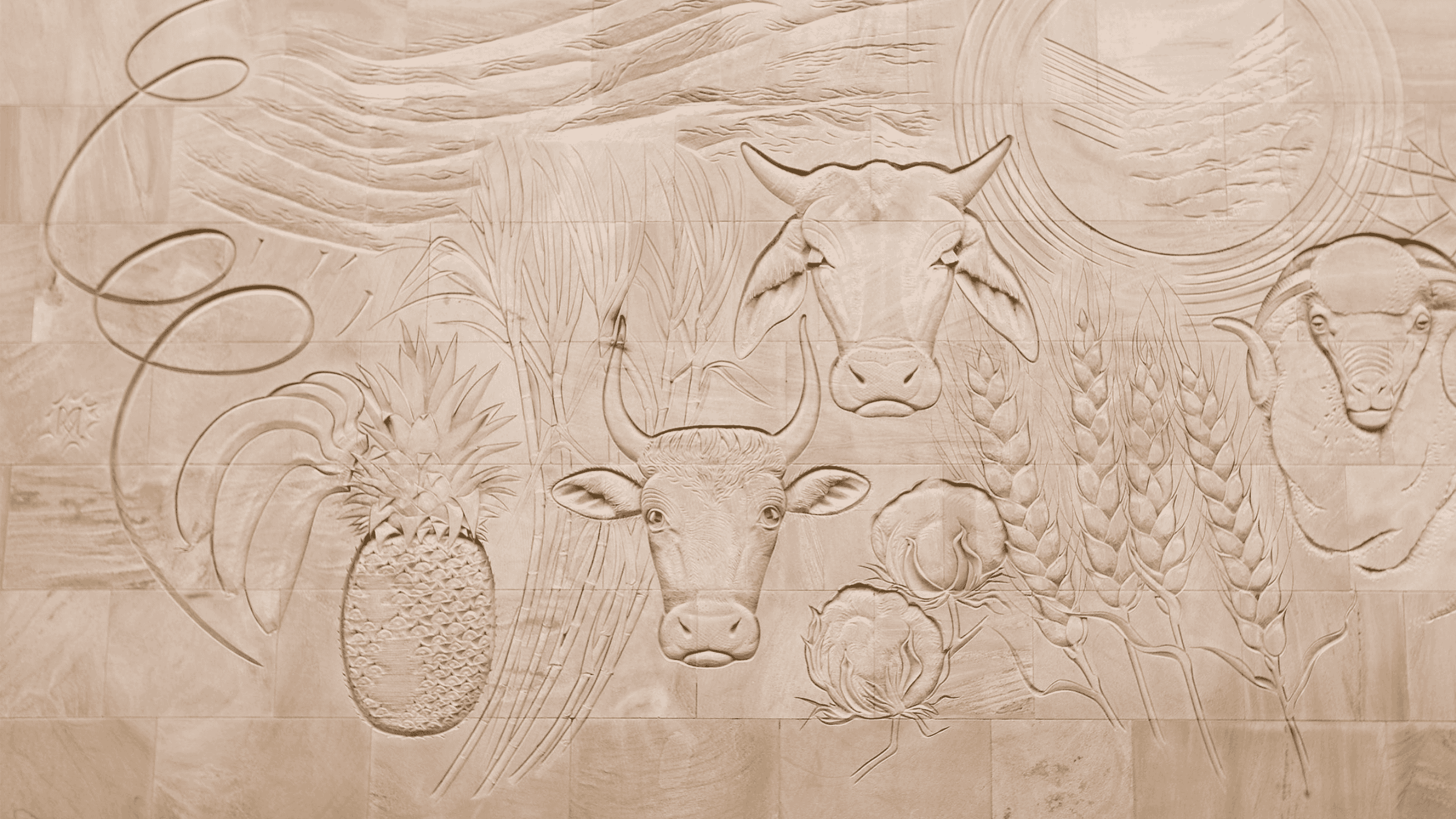 Hinwood's sandstone carving at UQ Gatton depicts Queensland’s agricultural industries of wool, beef, dairy, cotton, fruit, sugar cane and wheat, overlaid with representations of the weather extremes that impact all agriculture in the state.