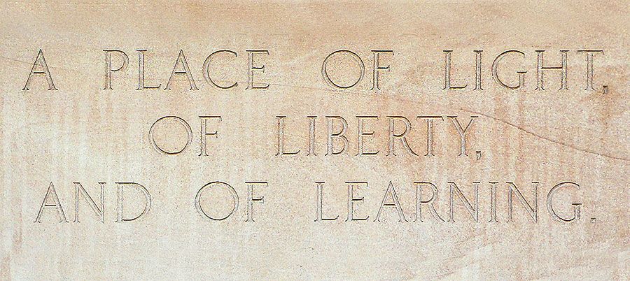 Inscription above the entrance to the Great Court-facing Forgan Smith tower, reading "A place of light, of liberty, and of learning", depicting British politician Benjamin Disraeli’s words uttered in 1873 to describe what a university should be.