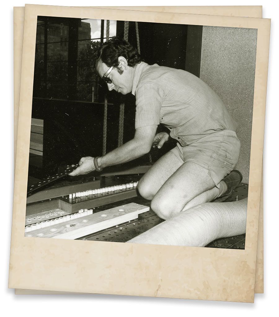Workers assembling the organ inside the Mayne Hall in 1976.