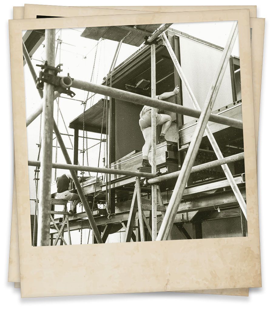 Workers assembling the organ inside the Mayne Hall in 1976.