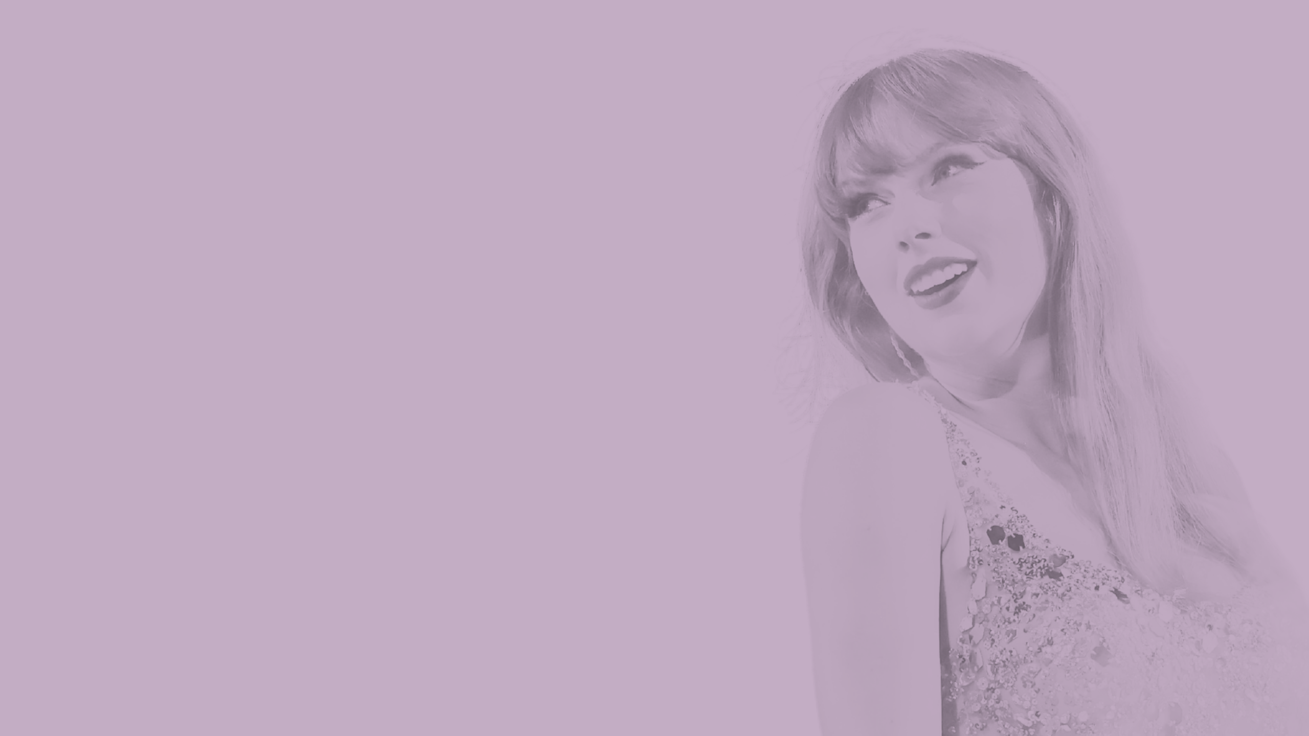 An image of Taylor Swift performing on stage.