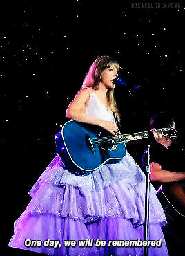 A GIF of Taylor Swift that says "One day, we will be remembered"
