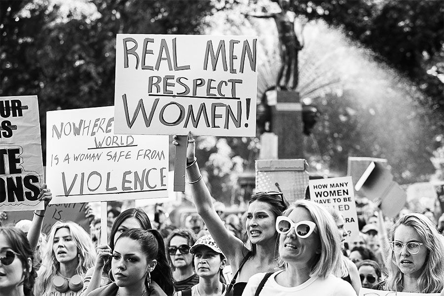 Demonstrators rally against gendered violence in Sydney.