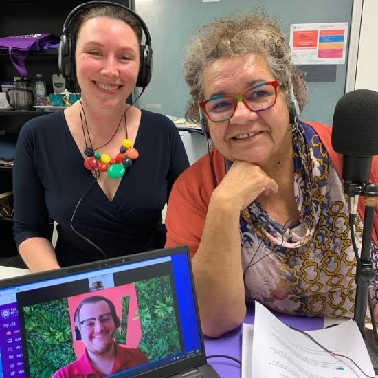 Dr Katelyn Barney and Professor Tracey Bunda at a desk with a microphone