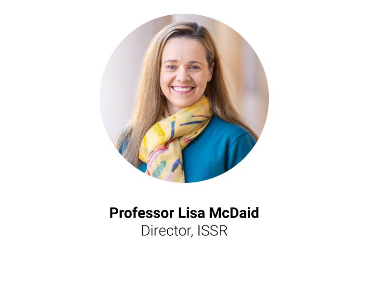 Lisa McDaid, a woman with brown hair, smiling broadly