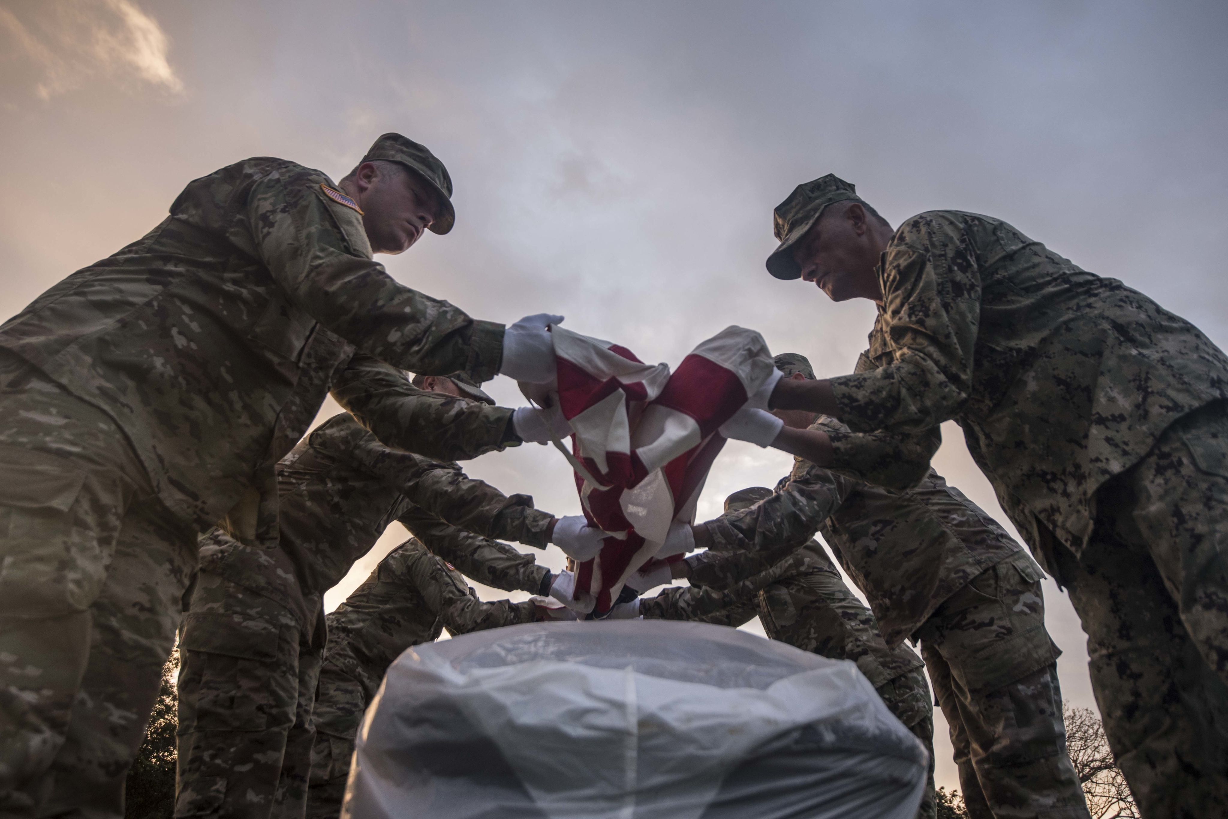 U.S. service members assigned to the Defense POW/MIA Accounting Agency (DPAA) participate in a disinterment ceremony held at the National Memorial Cemetery of the Pacific, Honolulu, Hawaii, Feb. 10, 2020. The ceremony was DPAA’s eighth disinterment of the fiscal year, continuing the mission to identify the remains of unknown service members lost during the Korean War. DPAA’s mission is to provide the fullest possible accounting of missing personnel to their families and the nation. (U.S. Air Force photo by SSgt Leah Ferrante)