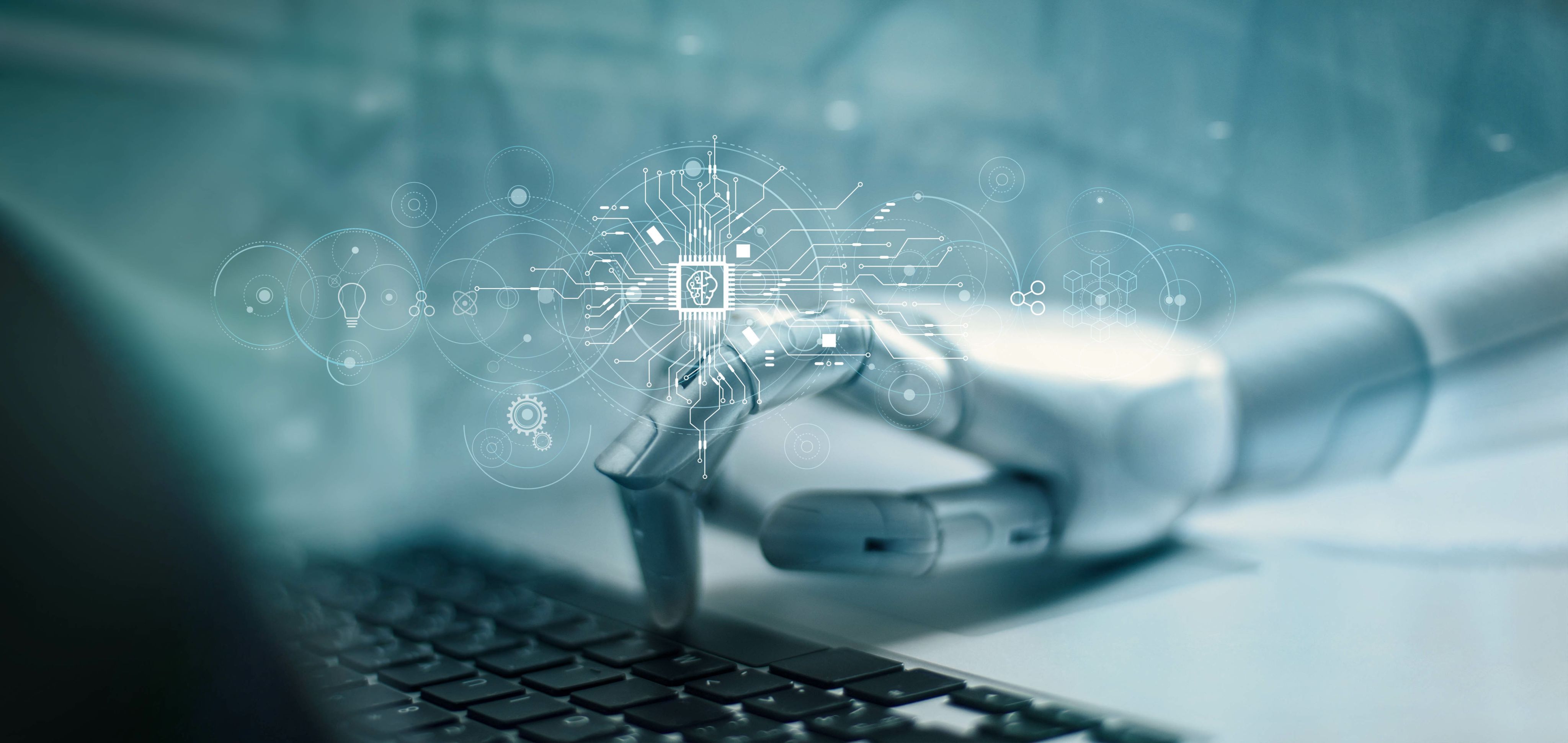 AI hand typing on keyboard