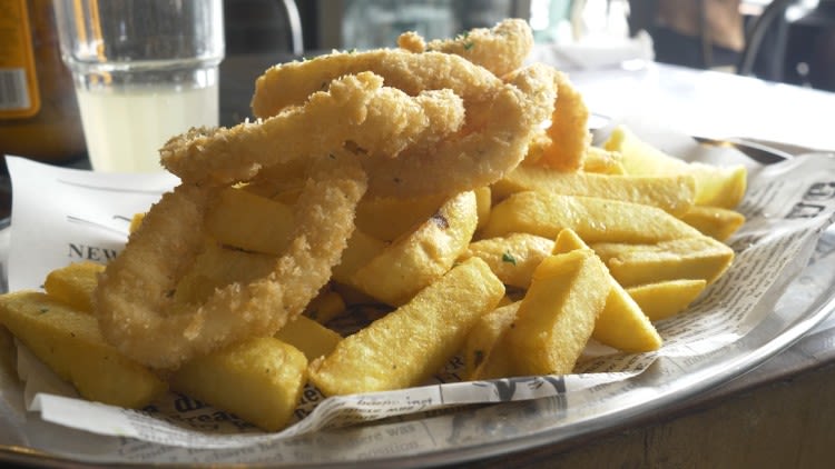 calamari and chips from seafood takeaway shop.