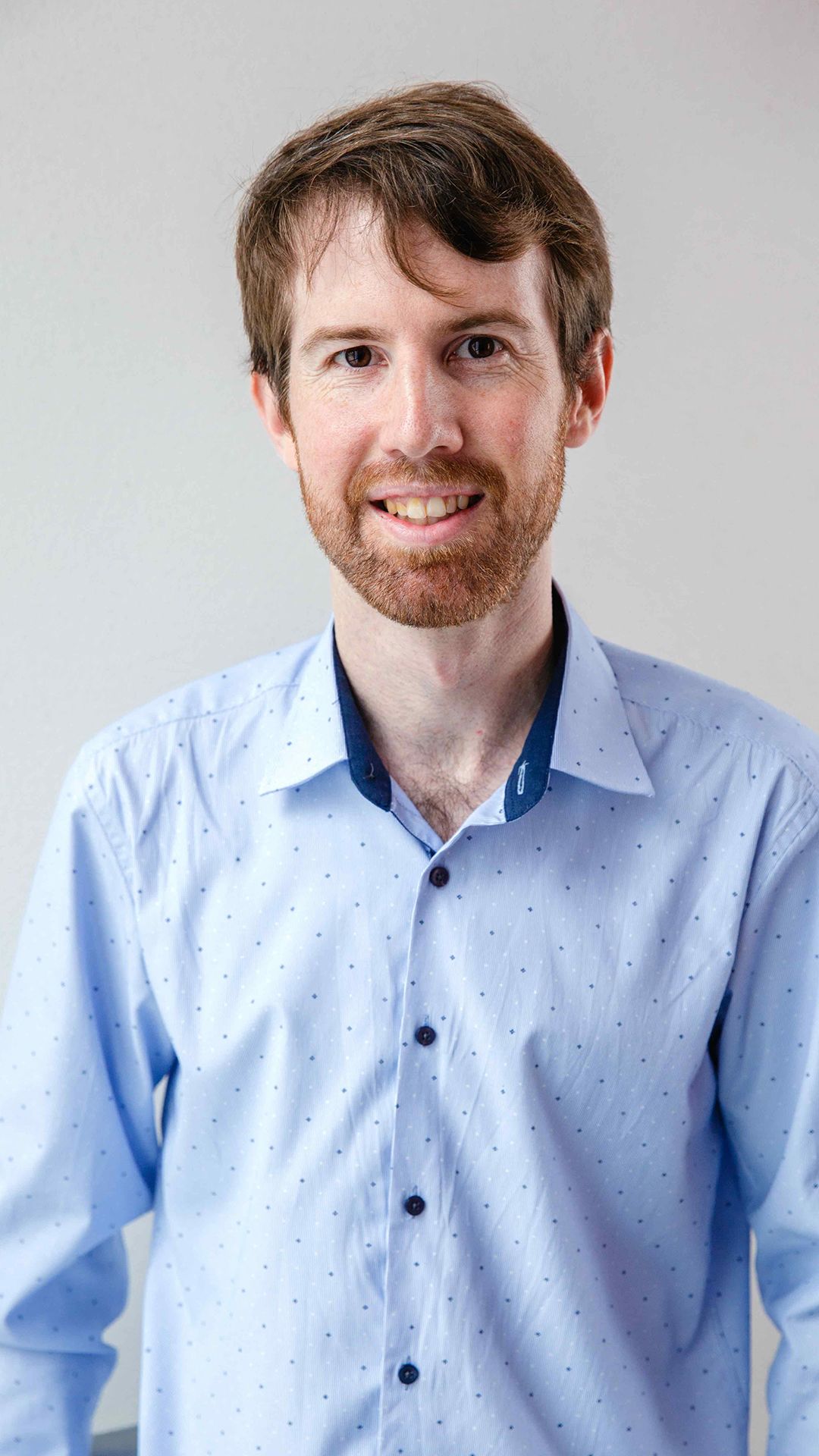 Headshot of Dr Jake O'Brien
