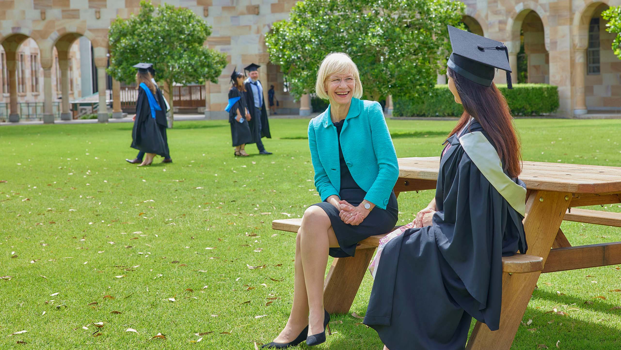 UQ Vice-Chancellor Professor Deborah Terry with to a UQ graduate.